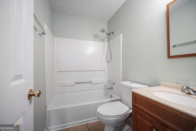 bathroom featuring toilet,  shower combination, tile patterned floors, vanity, and a textured ceiling