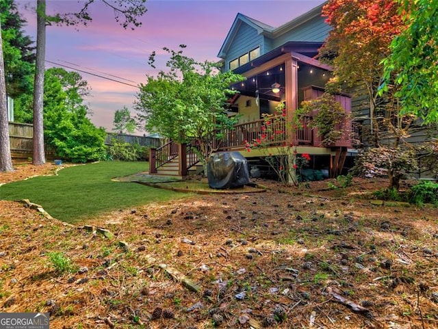 view of front of house with a wooden deck