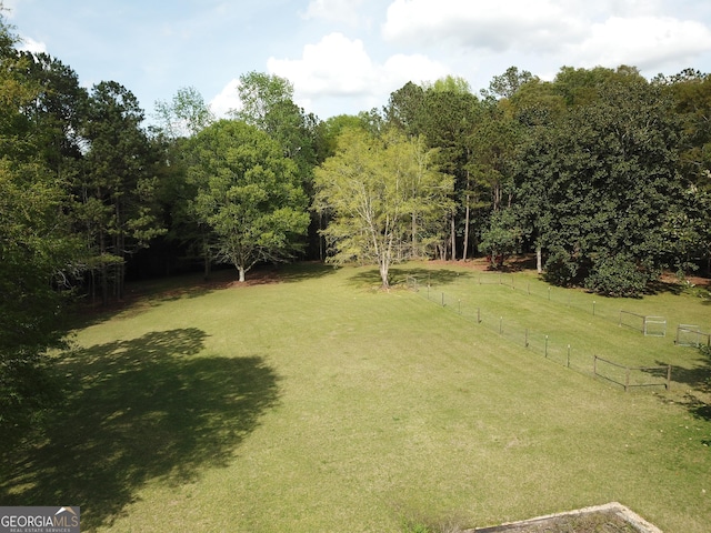 view of yard featuring fence