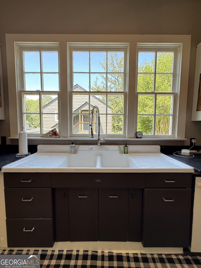 kitchen with light countertops and dishwashing machine