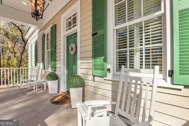 192 Myrtle Grove Ln, Richmond Hill, GA 31324 - property entrance featuring a porch