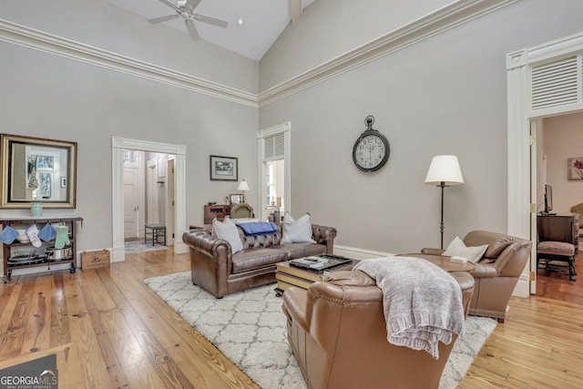 192 Myrtle Grove Ln, Richmond Hill, GA 31324 - living area featuring a ceiling fan, hardwood / wood-style floors, high vaulted ceiling, and baseboards