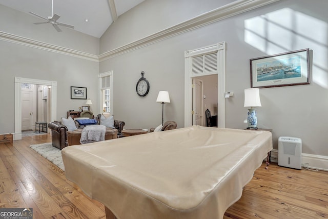192 Myrtle Grove Ln, Richmond Hill, GA 31324 - recreation room with light wood-style floors, baseboards, billiards, a ceiling fan, and high vaulted ceiling