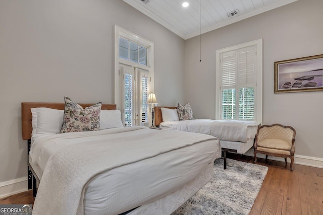 192 Myrtle Grove Ln, Richmond Hill, GA 31324 - bedroom with recessed lighting, visible vents, baseboards, ornamental molding, and wood finished floors