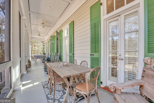 192 Myrtle Grove Ln, Richmond Hill, GA 31324 - sunroom / solarium with a ceiling fan and outdoor dining area