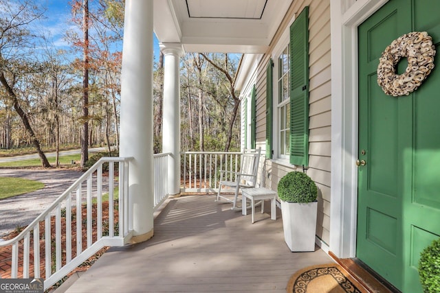 192 Myrtle Grove Ln, Richmond Hill, GA 31324 - exterior space featuring a porch