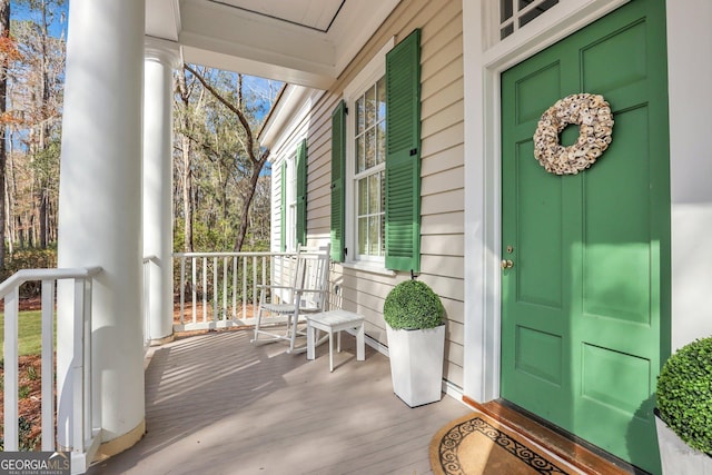 192 Myrtle Grove Ln, Richmond Hill, GA 31324 - doorway to property featuring covered porch