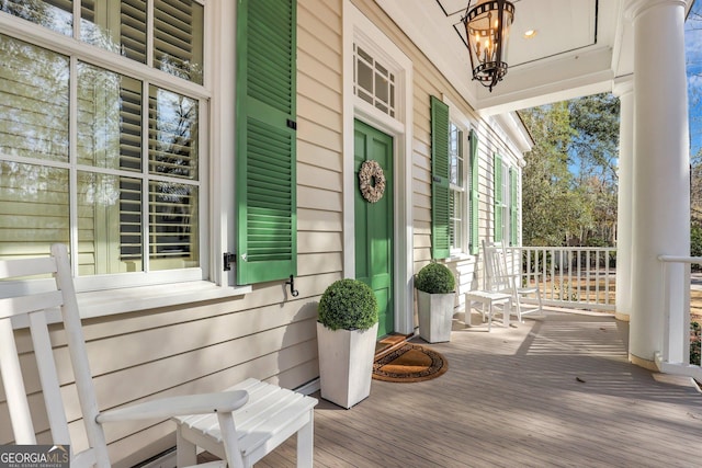 192 Myrtle Grove Ln, Richmond Hill, GA 31324 - doorway to property featuring covered porch