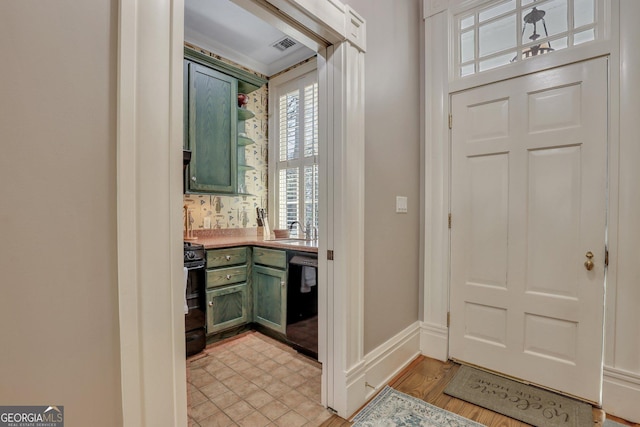 192 Myrtle Grove Ln, Richmond Hill, GA 31324 - foyer entrance with visible vents, light wood-style floors, and baseboards