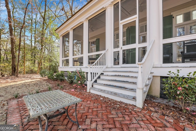 192 Myrtle Grove Ln, Richmond Hill, GA 31324 - exterior space featuring a sunroom