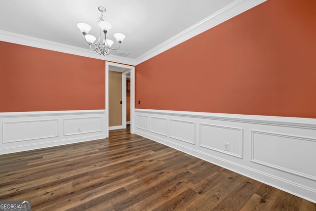 548 Myrtle Trace Ln, Suwanee, GA 30024 - unfurnished dining area with a chandelier, ornamental molding, a wainscoted wall, and dark wood-style floors