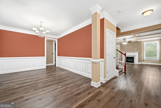 548 Myrtle Trace Ln, Suwanee, GA 30024 - unfurnished living room featuring a chandelier, crown molding, dark wood finished floors, ceiling fan, and wainscoting