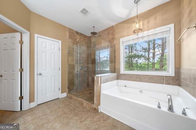 548 Myrtle Trace Ln, Suwanee, GA 30024 - full bath with a stall shower, a bath, and tile patterned flooring