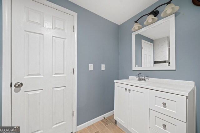 548 Myrtle Trace Ln, Suwanee, GA 30024 - bathroom with wood finished floors and vanity
