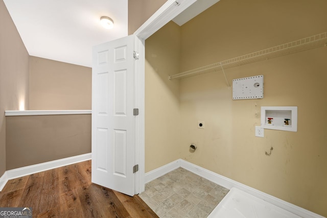 548 Myrtle Trace Ln, Suwanee, GA 30024 - laundry room with electric dryer hookup, washer hookup, and wood finished floors