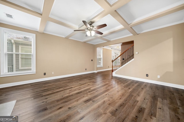 548 Myrtle Trace Ln, Suwanee, GA 30024 - unfurnished living room featuring a ceiling fan, coffered ceiling, stairway, wood finished floors, and beamed ceiling