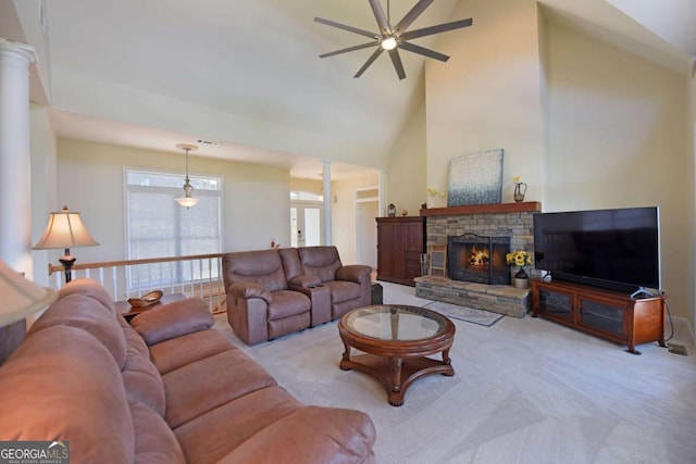 62 Eagles View Ct, Hayesville, NC 28904 - carpeted living area featuring a ceiling fan, ornate columns, a fireplace, and high vaulted ceiling