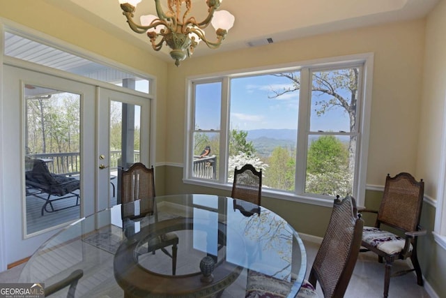 62 Eagles View Ct, Hayesville, NC 28904 - dining room with a chandelier, healthy amount of natural light, french doors, and a mountain view