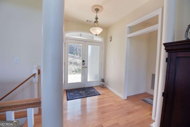 62 Eagles View Ct, Hayesville, NC 28904 - foyer with light wood-type flooring, french doors, and baseboards