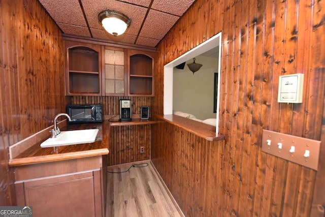 62 Eagles View Ct, Hayesville, NC 28904 - home office featuring wood walls, a sink, wood finished floors, and built in features