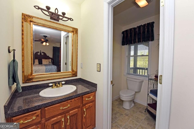 62 Eagles View Ct, Hayesville, NC 28904 - bathroom with ensuite bath, toilet, vanity, ceiling fan, and baseboards