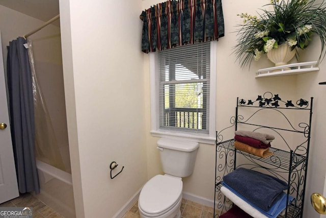 62 Eagles View Ct, Hayesville, NC 28904 - bathroom with baseboards, toilet, shower / bath combination with curtain, and tile patterned flooring