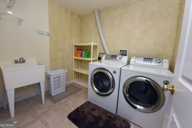 62 Eagles View Ct, Hayesville, NC 28904 - washroom with washing machine and dryer and light tile patterned floors
