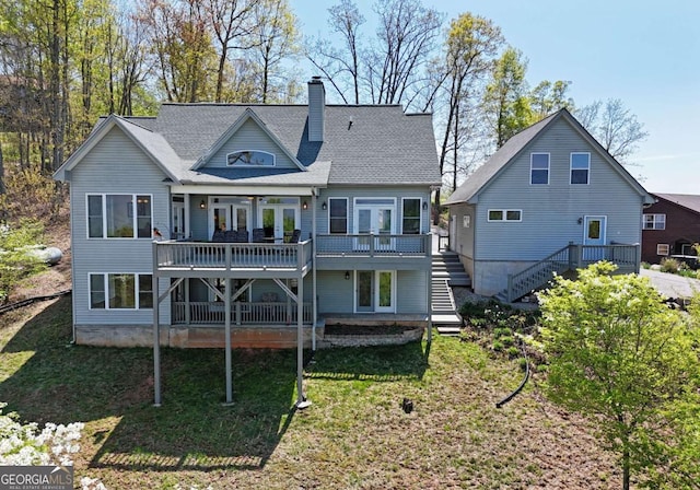 62 Eagles View Ct, Hayesville, NC 28904 - rear view of house featuring stairs, a chimney, a deck, and french doors