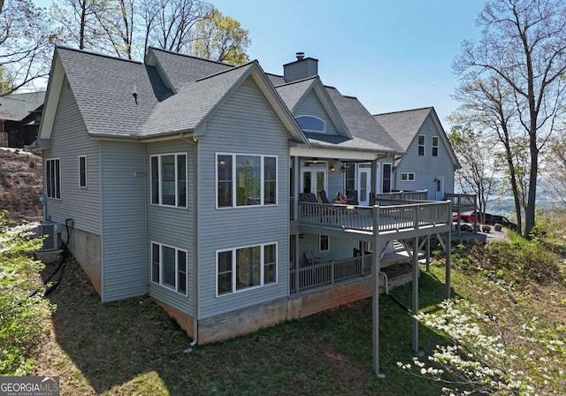 62 Eagles View Ct, Hayesville, NC 28904 - back of property with a chimney, central AC unit, a wooden deck, and a shingled roof