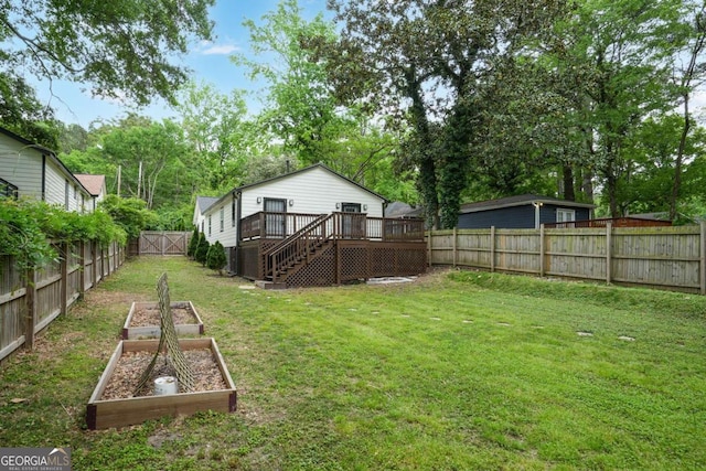 360 New Jersey Ave NW, Atlanta, GA 30314 - view of yard with a vegetable garden, a deck, and stairway
