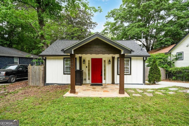 360 New Jersey Ave NW, Atlanta, GA 30314 - view of front of house featuring roof with shingles and board and batten siding