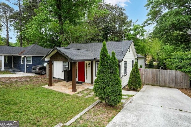 360 New Jersey Ave NW, Atlanta, GA 30314 - view of front of house with a shingled roof and board and batten siding