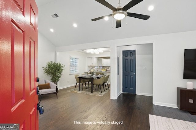 360 New Jersey Ave NW, Atlanta, GA 30314 - foyer with wood finished floors, vaulted ceiling, baseboards, ceiling fan, and a chandelier
