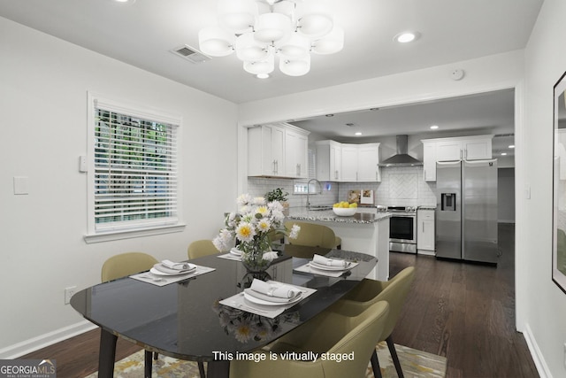 360 New Jersey Ave NW, Atlanta, GA 30314 - dining room featuring a chandelier, dark wood finished floors, baseboards, and recessed lighting