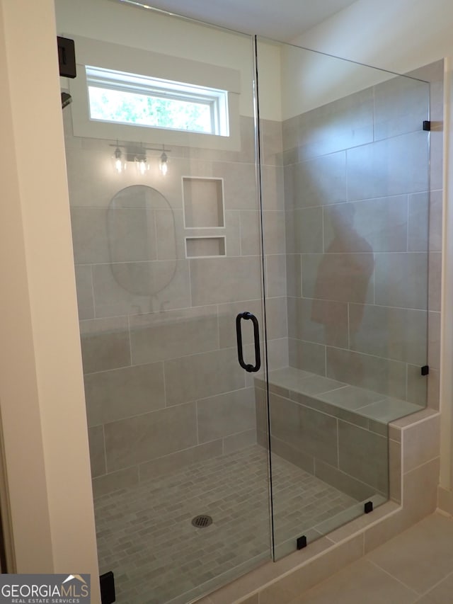 45 Hometown Ct, Jefferson, GA 30549 - full bathroom featuring tile patterned flooring and a shower stall