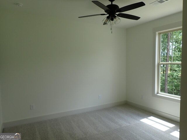 45 Hometown Ct, Jefferson, GA 30549 - spare room featuring carpet, visible vents, a ceiling fan, and baseboards