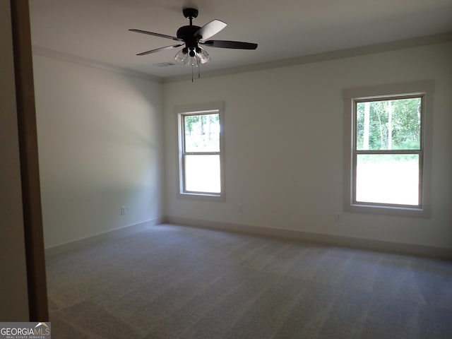 45 Hometown Ct, Jefferson, GA 30549 - unfurnished room featuring visible vents, light carpet, a ceiling fan, and baseboards