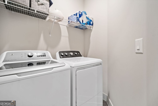 laundry room with laundry area and independent washer and dryer