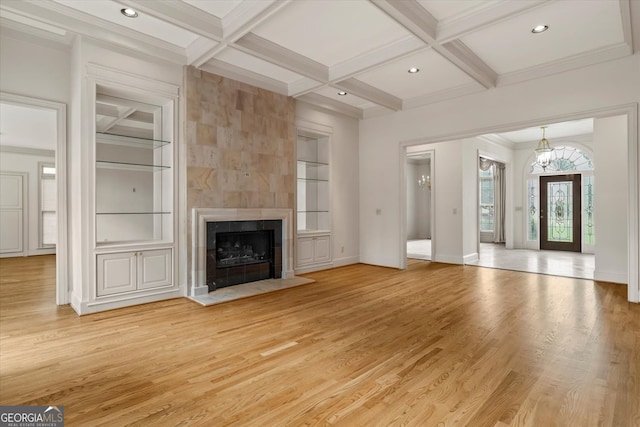 5510 Conway Dr, Marietta, GA 30068 - unfurnished living room with crown molding, light wood-style flooring, coffered ceiling, and beam ceiling
