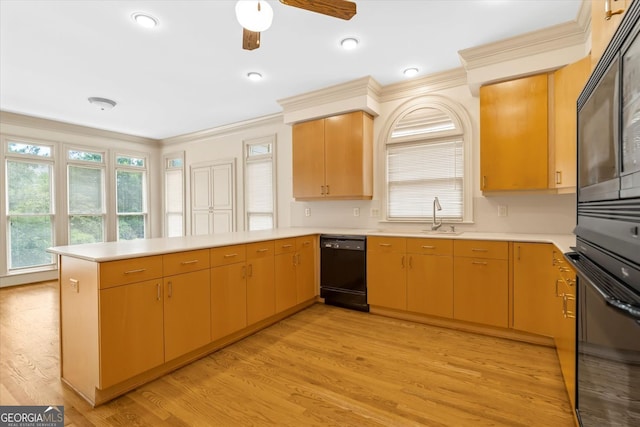 5510 Conway Dr, Marietta, GA 30068 - kitchen with a ceiling fan, crown molding, light countertops, black appliances, and a peninsula