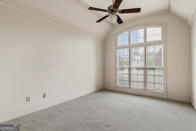 5510 Conway Dr, Marietta, GA 30068 - carpeted empty room with visible vents, ornamental molding, baseboards, a ceiling fan, and vaulted ceiling