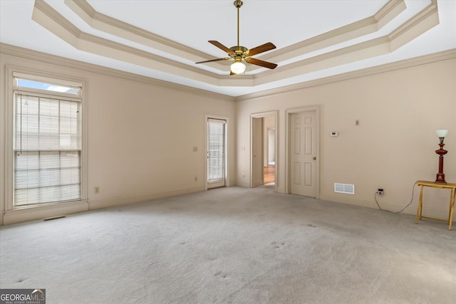 5510 Conway Dr, Marietta, GA 30068 - unfurnished room featuring visible vents, ornamental molding, and a raised ceiling