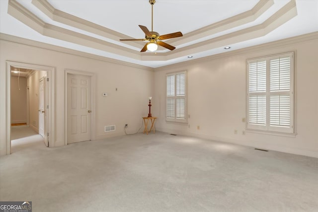5510 Conway Dr, Marietta, GA 30068 - unfurnished room with crown molding, ceiling fan, carpet floors, a tray ceiling, and visible vents