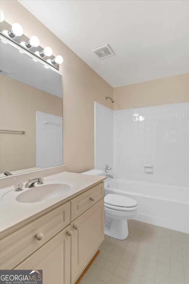 5510 Conway Dr, Marietta, GA 30068 - bathroom featuring visible vents, shower / tub combination, tile patterned floors, vanity, and toilet