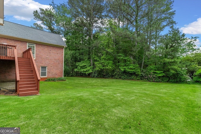 5510 Conway Dr, Marietta, GA 30068 - view of yard featuring a wooden deck and stairs