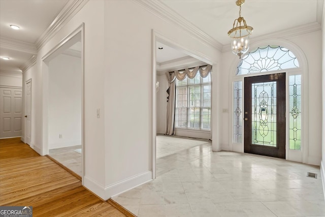 5510 Conway Dr, Marietta, GA 30068 - entryway featuring crown molding, baseboards, and a chandelier