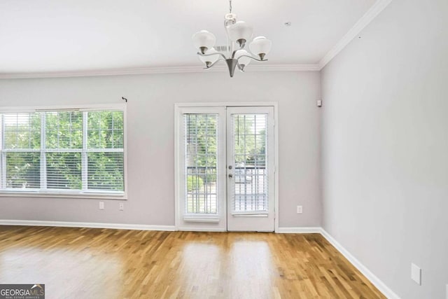kitchen with light wood-style flooring, a sink, tasteful backsplash, a notable chandelier, and stainless steel range with electric stovetop