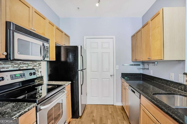 unfurnished room featuring ceiling fan, ornamental molding, and light wood finished floors