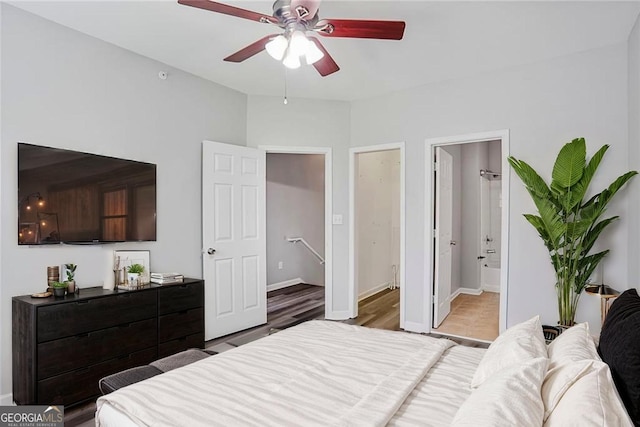 doorway to outside with a notable chandelier, light wood-type flooring, french doors, baseboards, and ornamental molding