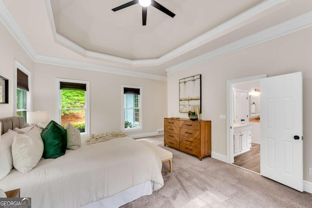 1400 Squire Ln, Cumming, GA 30041 - bedroom featuring a tray ceiling, baseboards, light colored carpet, ensuite bath, and ornamental molding